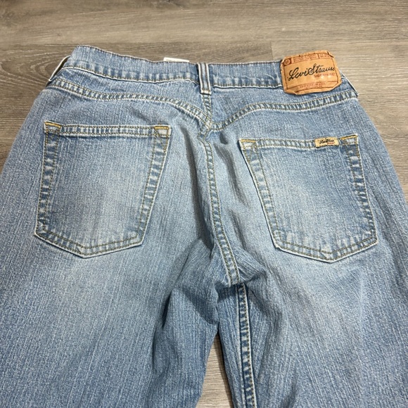 Levi's 515 Bootcut Jeans in a light-wash blue denim finish. Misses 4 short - Picture 7 of 7